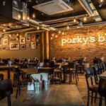 I ristoranti Porky’s BBQ cercano 650 mila sterline in crowdfunding. Emet raccoglie 127 mln $ per fondo Npl. Jab lancia opa sulle ciambelle Krispy…