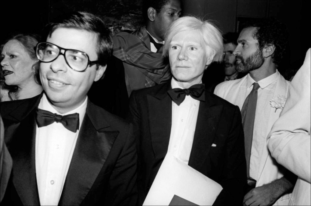 Andy Warhol & Bob Colacello arrive at Times Square, New York, September 19, 1979. (Photo by Allan TannenbaumGetty Images)